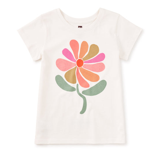 White t-shirt with a colorful flower design on a white background