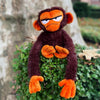Cuddly grumpy monkey plush with soft features