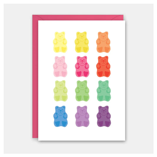 White card with multicolor gummy bears printed on it with pink envelope