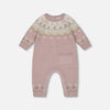 Pink baby romper with floral pattern on a light gray background