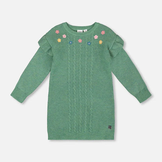 Green sweater dress with floral embroidery on a light gray background