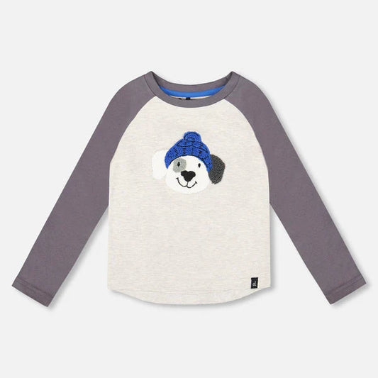 Long-sleeve shirt with a dog wearing a blue beanie on a white background