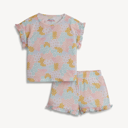 Children's top and shorts set with pink and yellow pattern on a white background