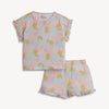 Children's top and shorts set with pink and yellow pattern on a white background