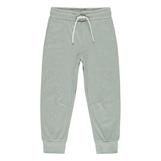 Green athletic sweatpants with a drawstring 