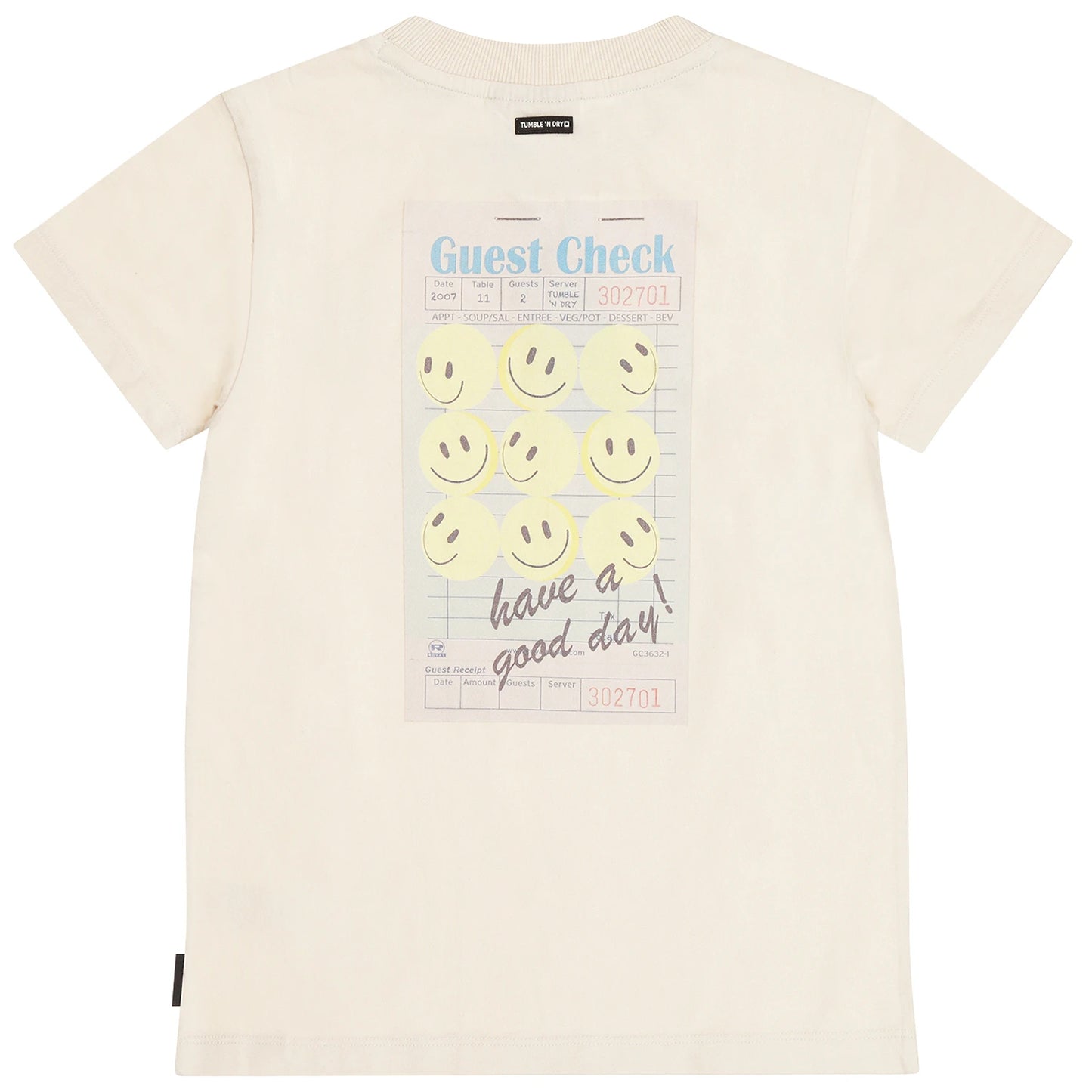 Beige t-shirt with smiley face design and text that says Have a Good Day