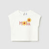 white top with the word 'hola' embroidered on it