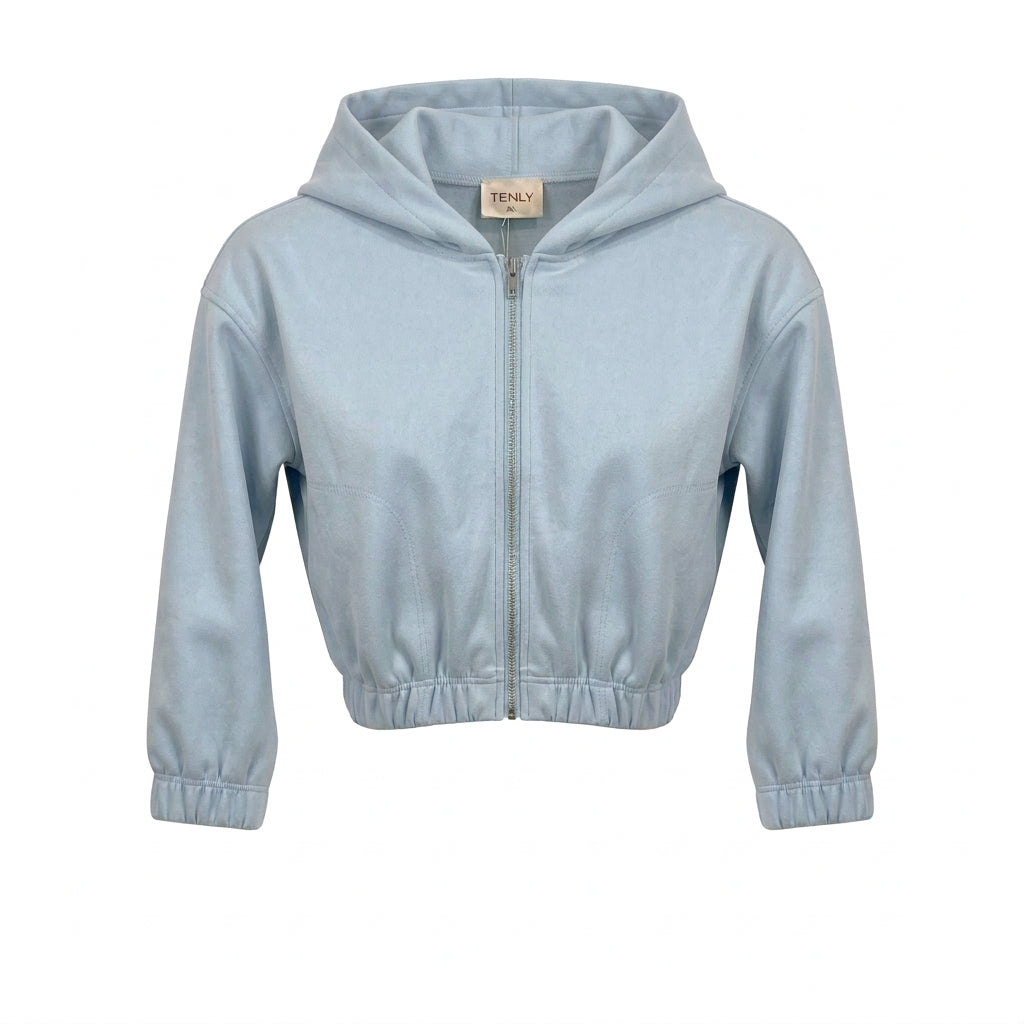 A light blue cropped zip-up hoodie with a drawstring hood and elastic cuffs, shown against a plain white background.