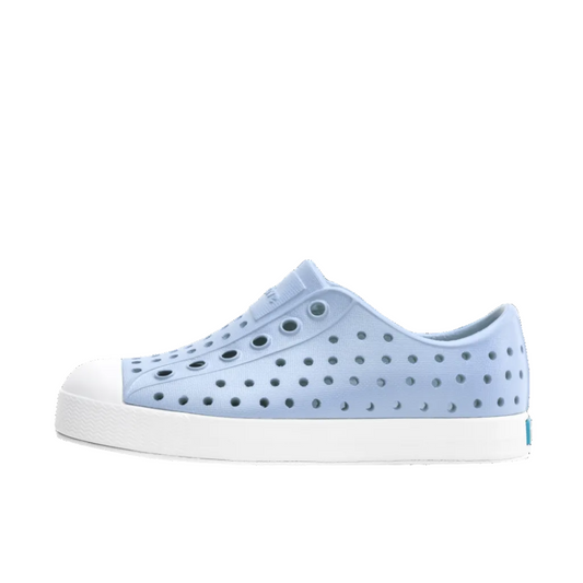 Light blue sneaker with white sole on a white background