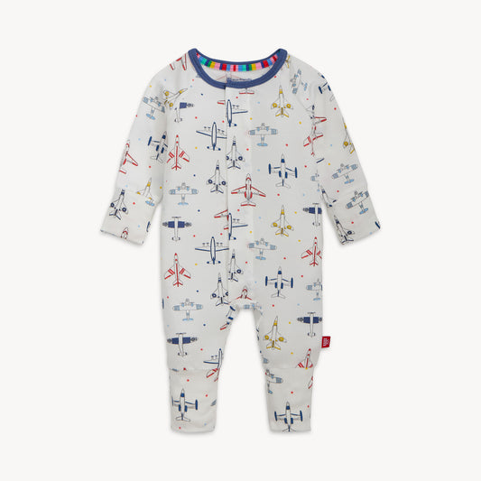 Baby romper with airplane pattern and magnetic closure