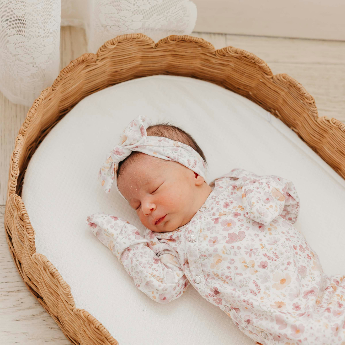Floral print baby gown with knotted bottom