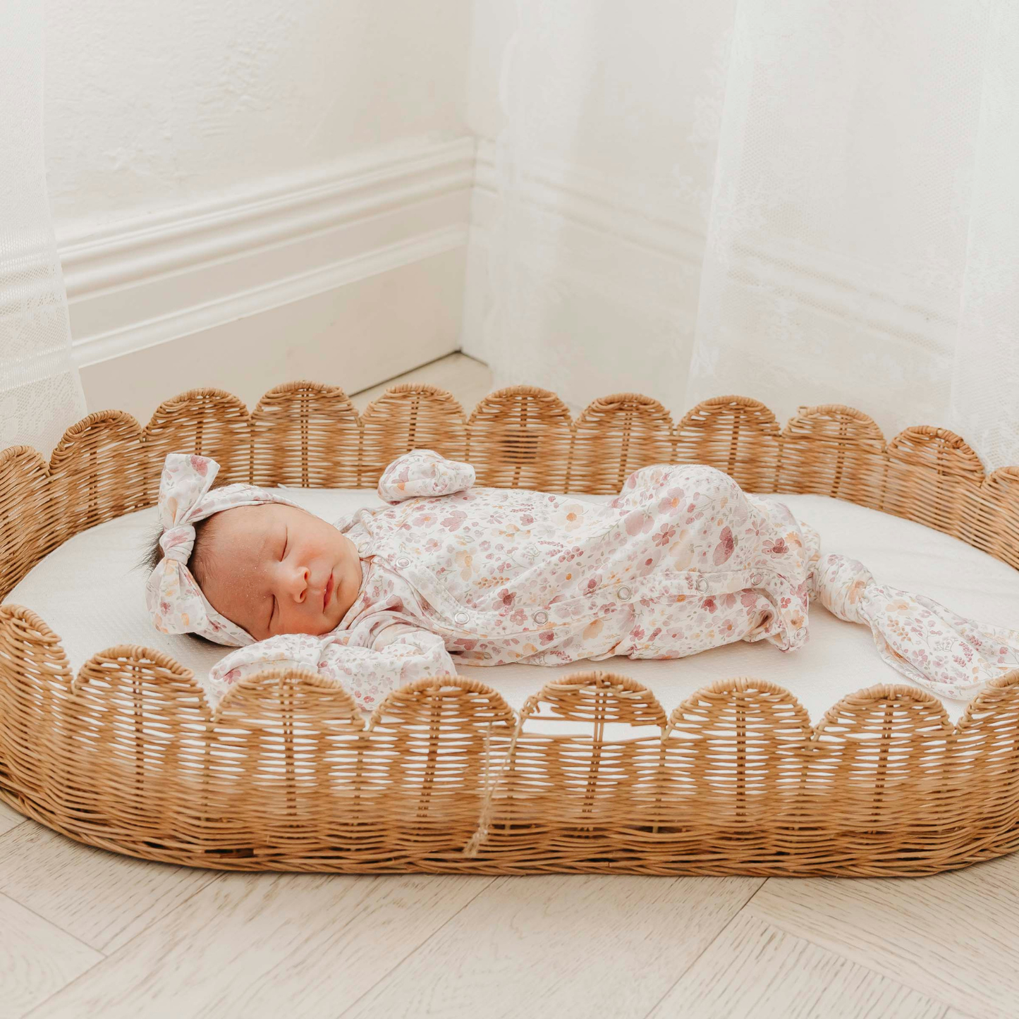 Floral print baby gown with knotted bottom