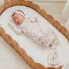 Floral print baby gown with knotted bottom