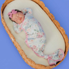 Floral baby knotted gown with pink trim and snaps