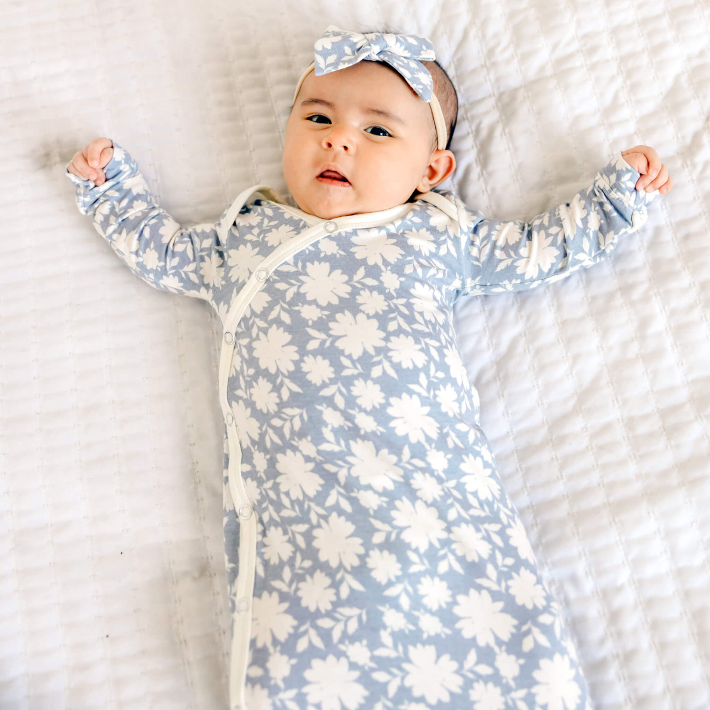 Lavender floral baby knotted gown with white trim