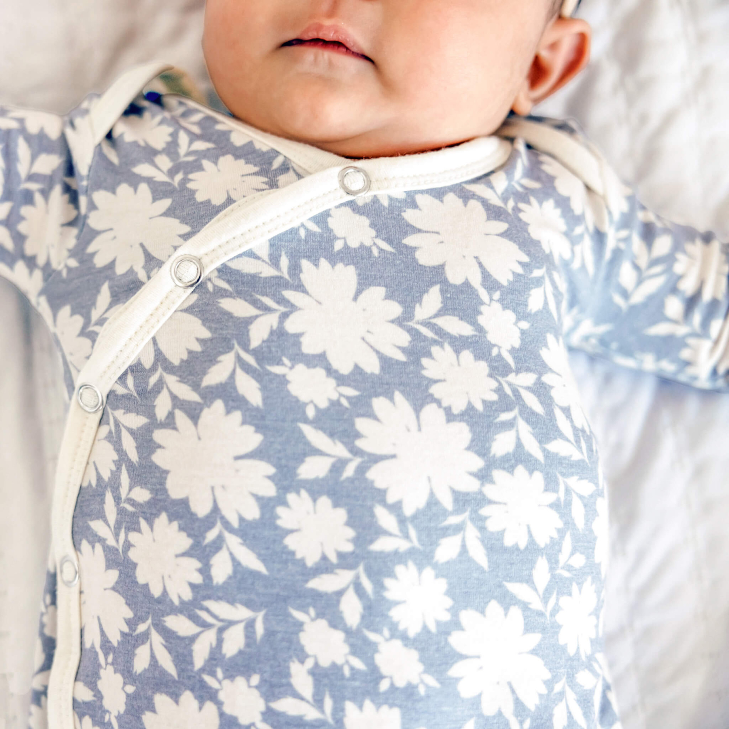 Lavender floral baby knotted gown with white trim
