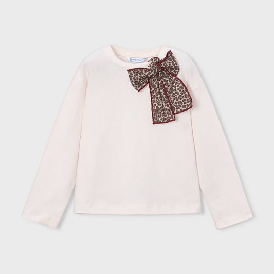 White long-sleeve top with a leopard print bow on a light gray background