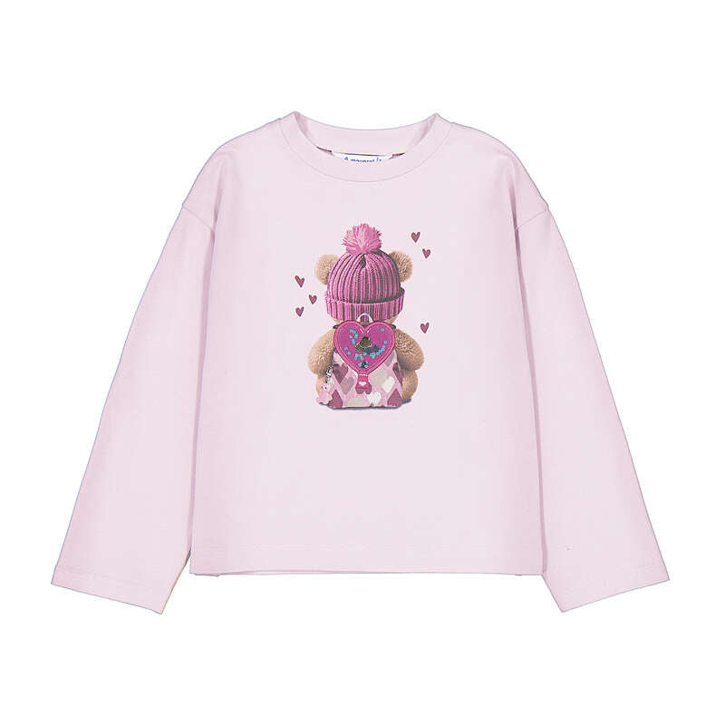 A light pink long-sleeve crewneck sweatshirt featuring a graphic of a teddy bear wearing a pink striped knit hat and holding a pink heart, surrounded by small pink hearts.