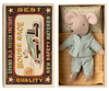 Stuffed mouse toy in a matchbox with a vintage-style matchbox design.