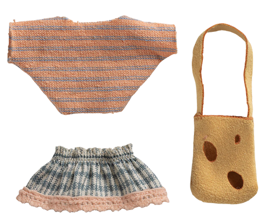 Knitted outfit with striped top, skirt, and bag on a white background