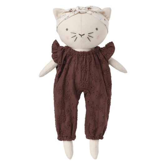 A plush cat doll with cream-colored fabric body, embroidered facial features, a matching cream headband with bow, and dark brown eyelet lace romper, centered on a light gray background.
