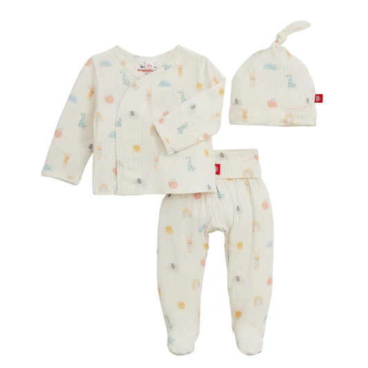 Baby outfit set with kimono top, footed pants, and hat 