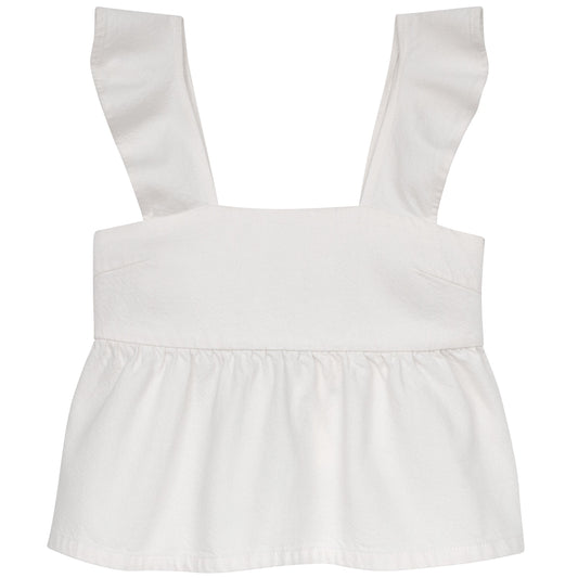 White top with ruffled straps on a white background