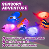 Colorful mermaid and sea creature bath toys on white background.