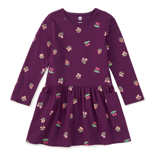 A long-sleeve purple dress for toddlers or girls, featuring a small all-over floral and berry print, a gathered waist, and two front patch pockets, shown flat on a white background.