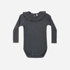 A dark gray ribbed long-sleeve baby bodysuit with a ruffled collar, displayed flat against a light gray background.