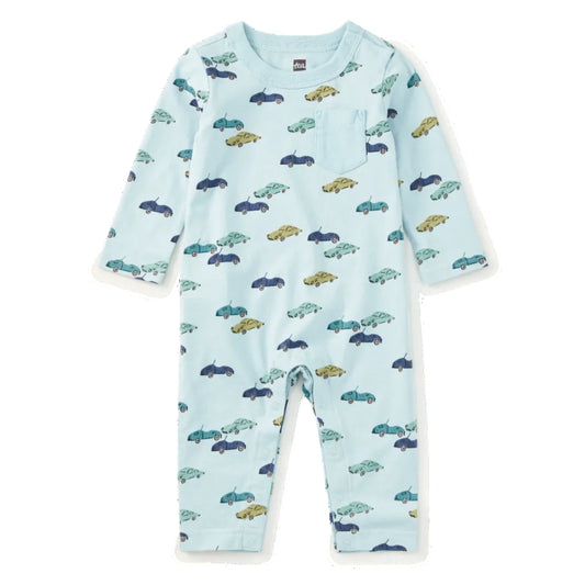 A baby long-sleeve footless romper in light blue, featuring an all-over pattern of small cars in navy, teal, and olive green, with a chest pocket.