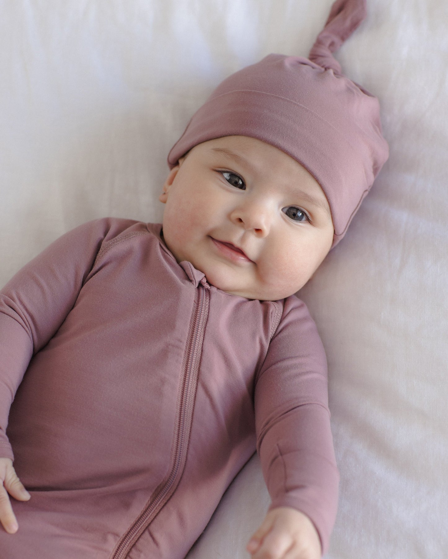 Mulberry Bamboo Zip Footie, lifestyle photo of baby