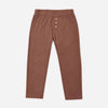 A pair of toddler's slim-fit pants in a warm rust brown color, featuring an elastic waistband and three decorative buttons down the front, displayed on a clean white background.