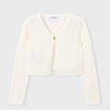 White cardigan on a light gray background
