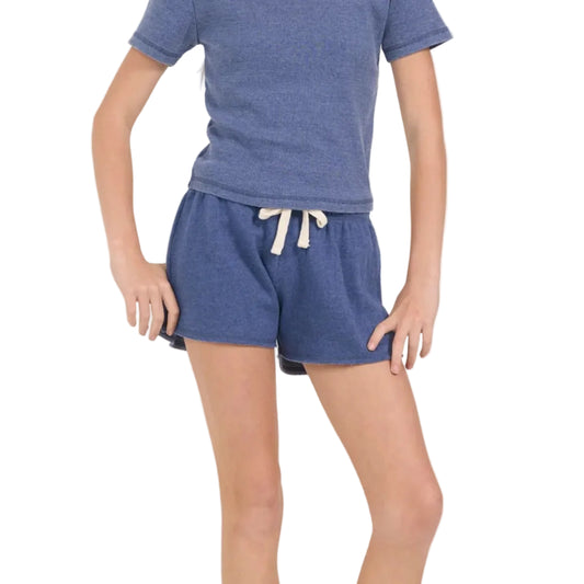 Girl wearing a blue shorts