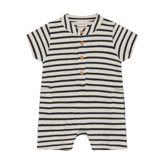 Striped baby romper with button details on a white background