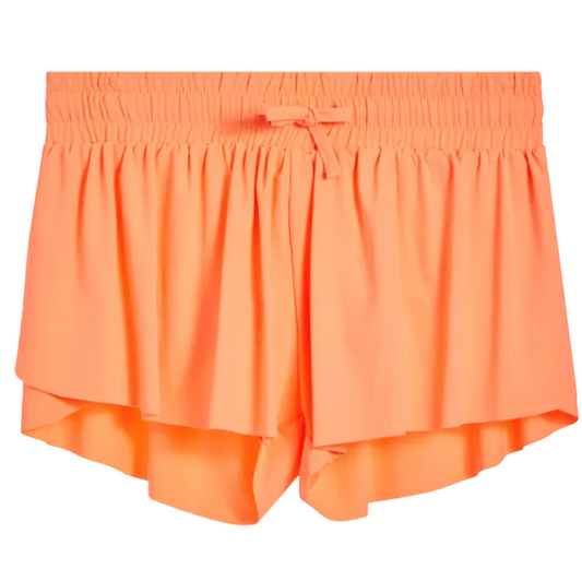 Neon orange shorts on a white background