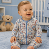 Baby wearing an zip up pajama with Fourth of July theme graphic
