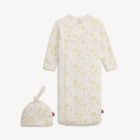 Pink and white baby gown and hat with yellow star pattern and matching hat.
