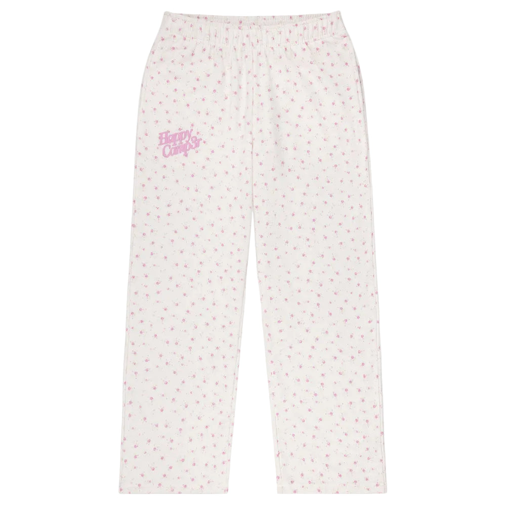 White pajama pants with pink floral pattern and 'Happy Camp3r' text 
