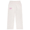 White pajama pants with pink floral pattern and 'Happy Camp3r' text 