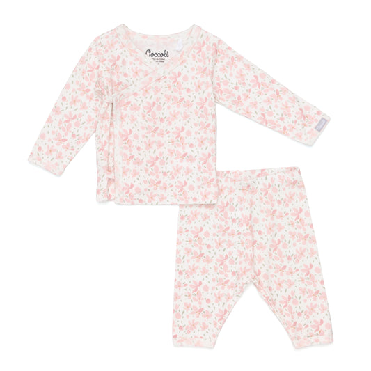 Floral pajama set with long-sleeve top and pants on a white background