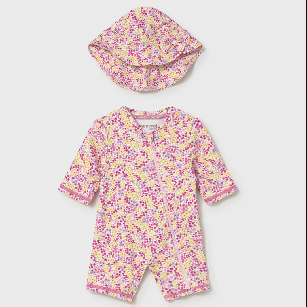 Floral baby romper with hood on a white background