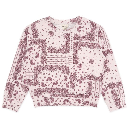Pink patterned blouse on a white background