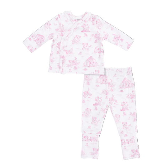 Children's pajama set with pink floral pattern on a white background