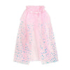 A pink tulle cape with iridescent blue and silver sequins scattered across the lower half, featuring a ruffled neckline.