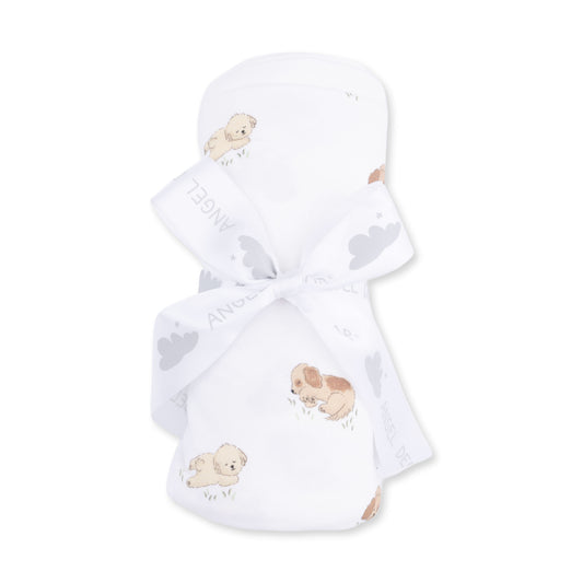 Baby swaddle with puppy designs on a white background