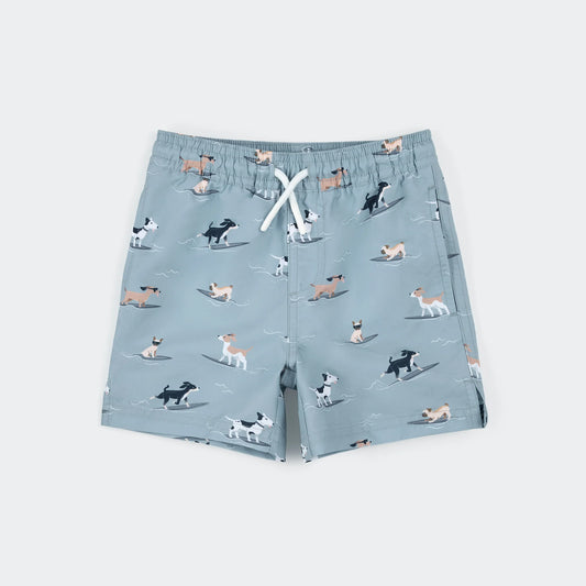 Children's shorts with dog pattern on a light blue background