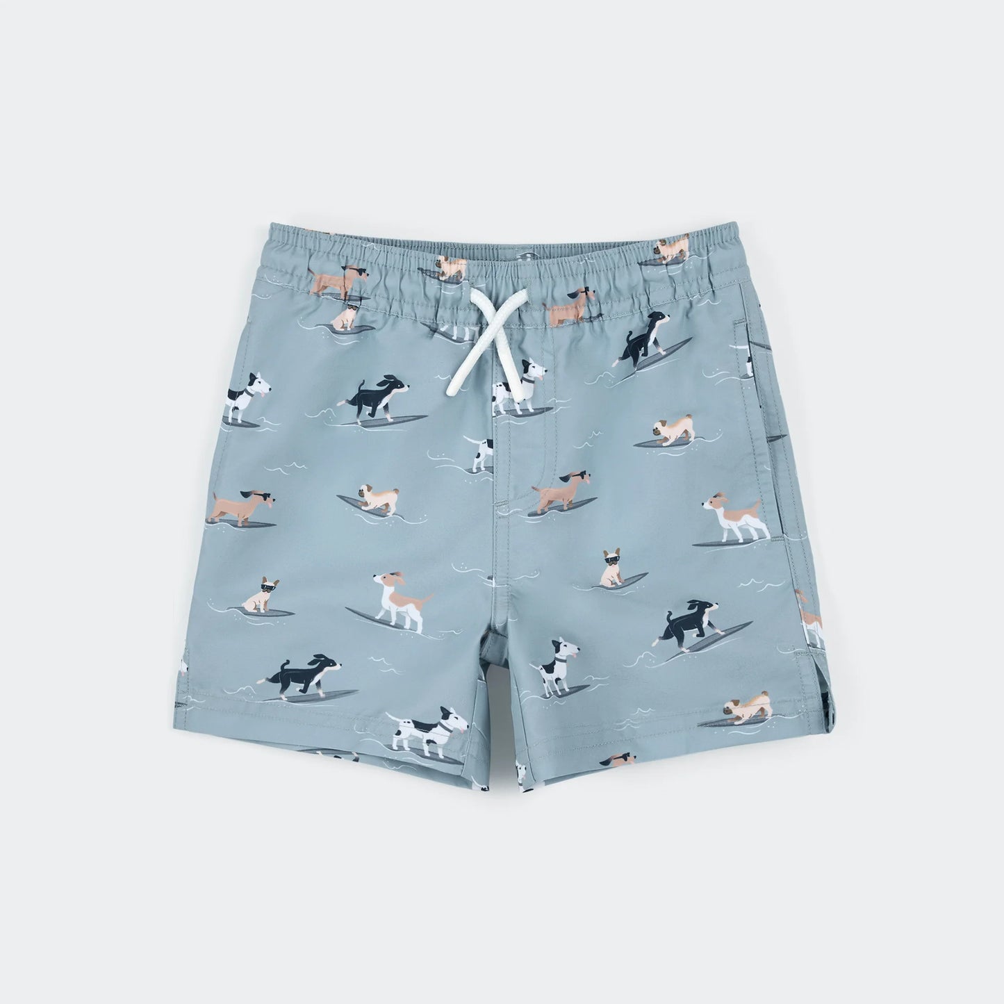 Children's shorts with dog pattern on a light blue background