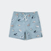 Children's shorts with dog pattern on a light blue background
